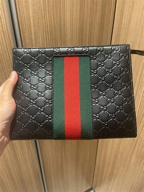 gucci portfolio bag|gucci men clutch.